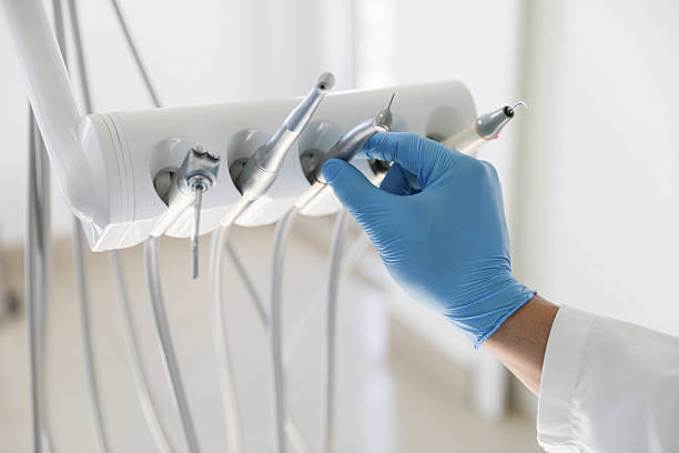 Professional Tooth Extraction technician working in Selden, NY